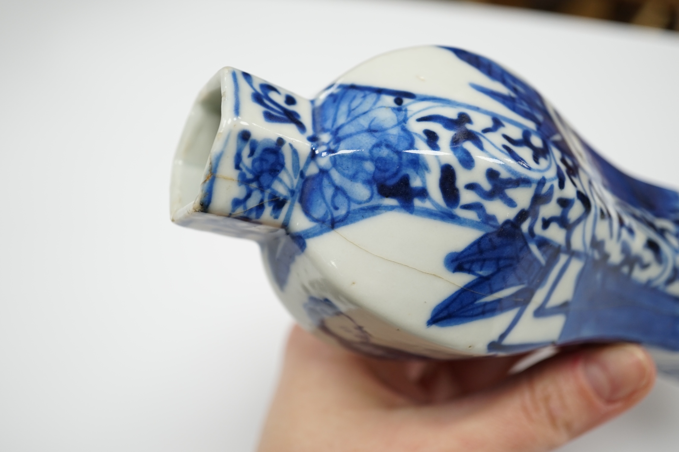 A small Chinese blue and white hexagonal vase, 19th century, 14cm